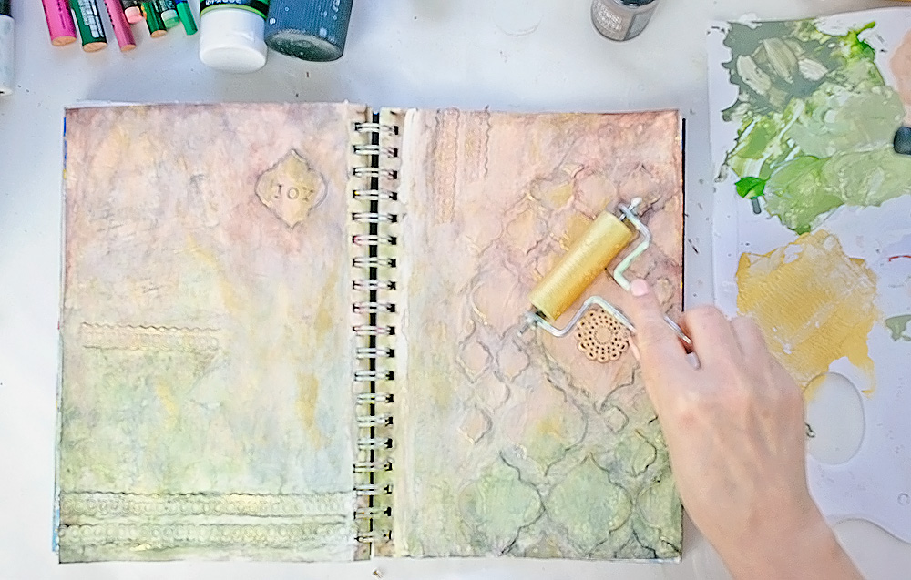 Art Journal 2 - Mixed Media Painting - applying golden paint with brayer